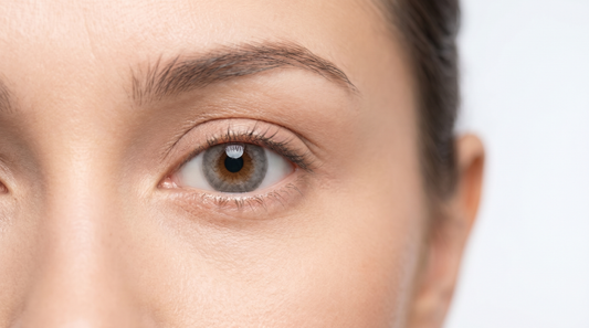 Gray colored contact lens close-up demonstrating safe contact lens wear